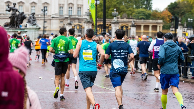People taking part in an organised run through a city